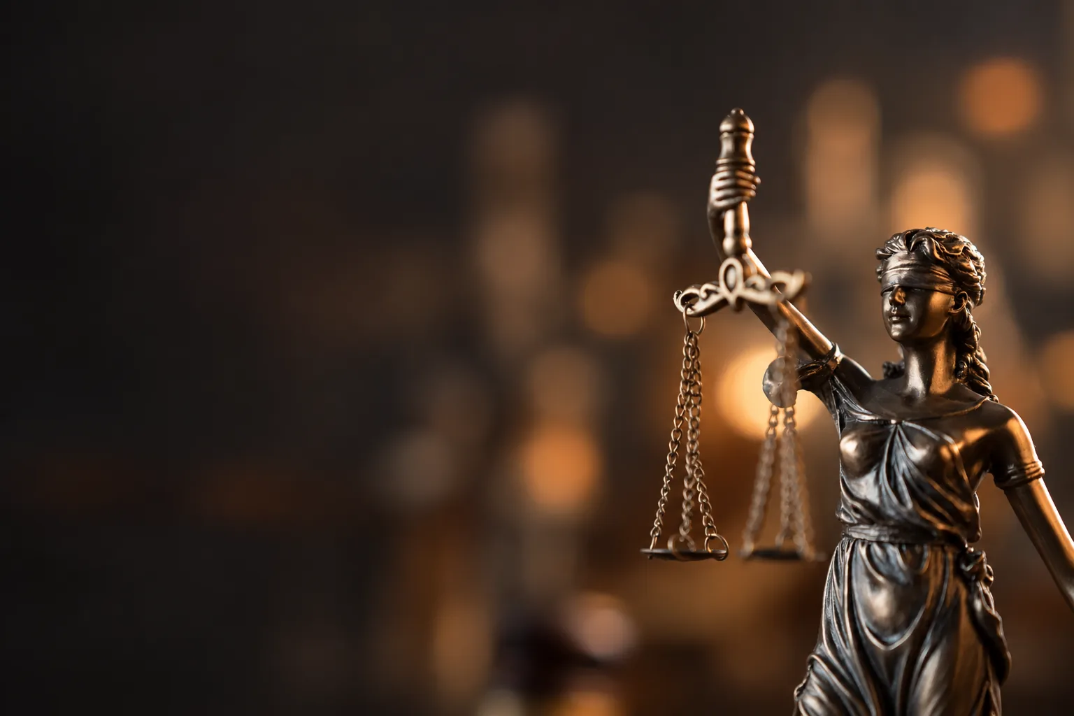 Lady Justice statue holding scales